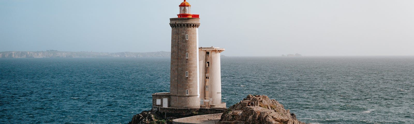 A lighthouse by the sea