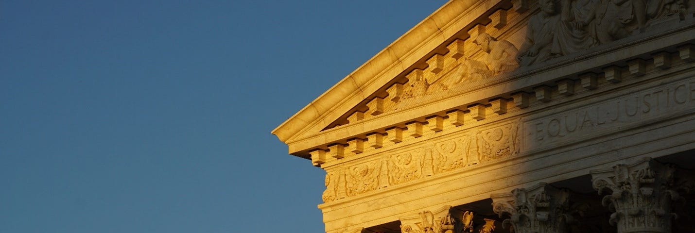 The sun sets on the United States Supreme Court building.