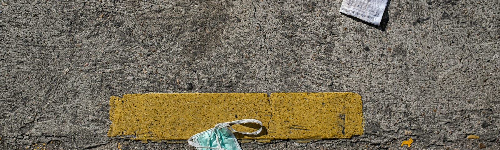 IMAGE: A dirty coronavirus mask on the floor