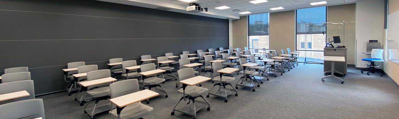 Desks are pictured in room 2046 of Capitol Federal Hall with the retractable wall in the room down