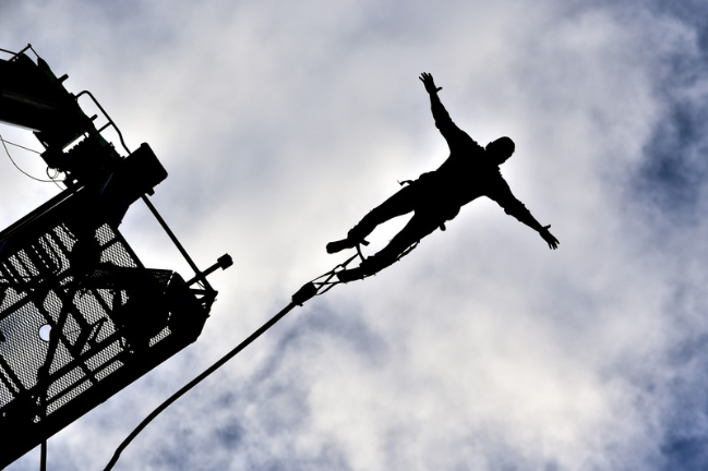 man bungee jumping