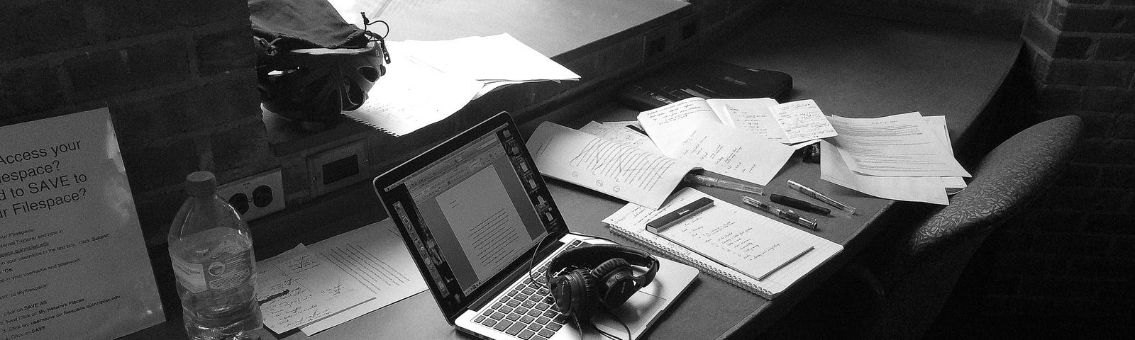 A messy writing desk of mine from the past. Hamden, Connecticut, U.S.A., July 2014.