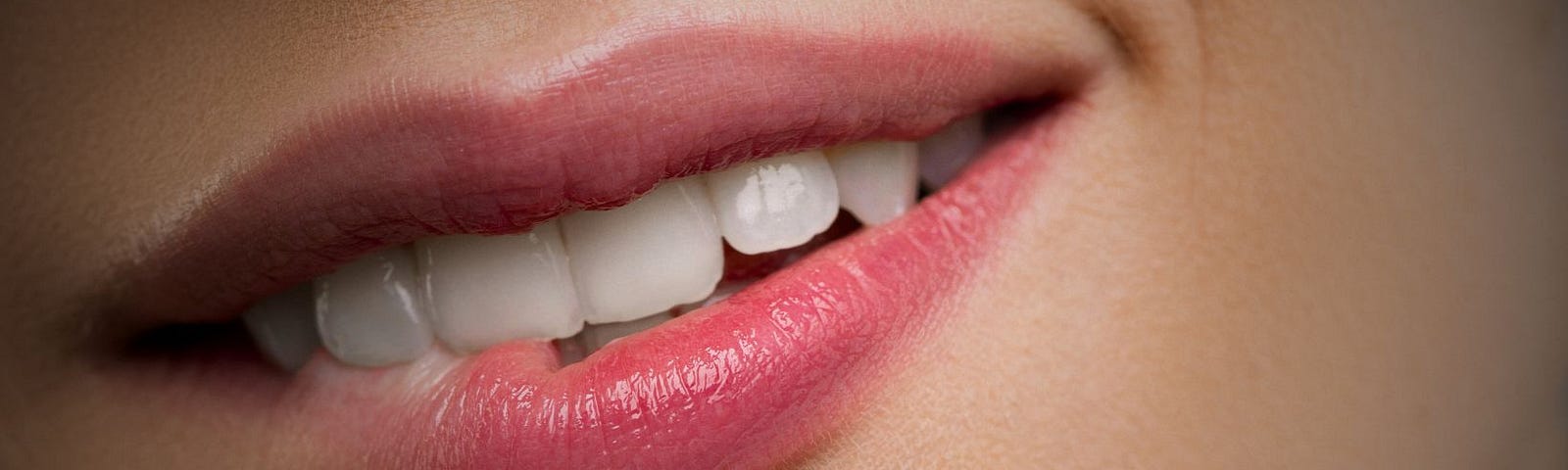 a woman bites her bottom lip seductively