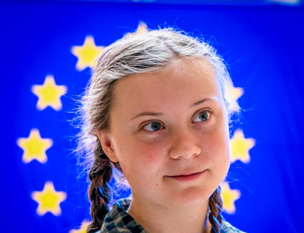 Greta Thunberg, framed by the stars on the EU flag
