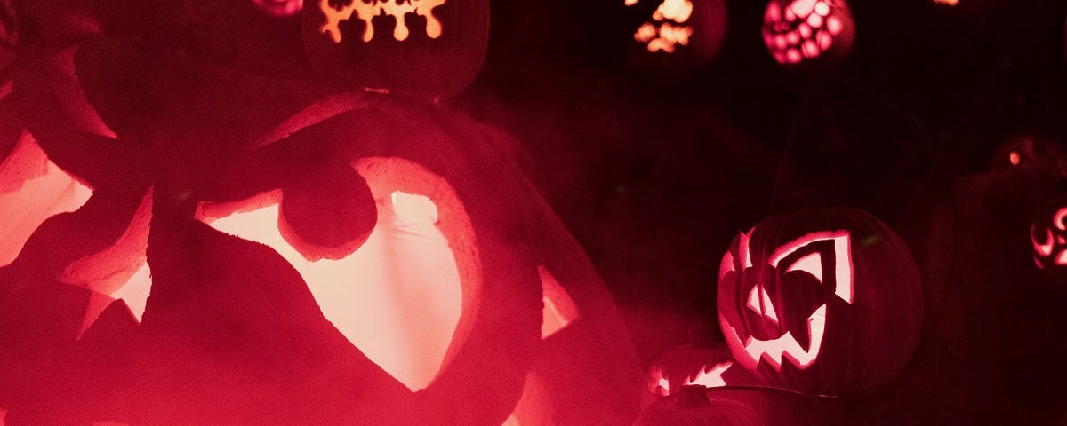 A surfeit of illuminated pumpkin lanterns