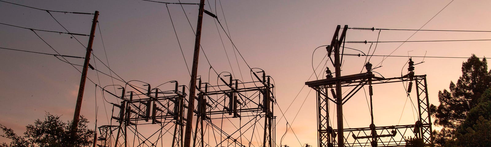 A car drives passed a power station in Mill Valley, California as a statewide blackout continues on October, 10, 2019.