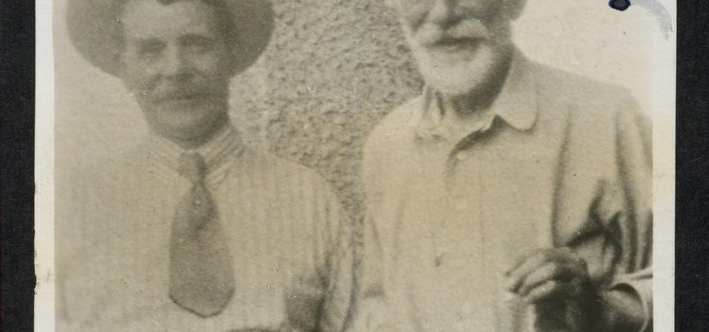 Three quarter length shot of George Merrill and Edward Carpenter, early 1900s