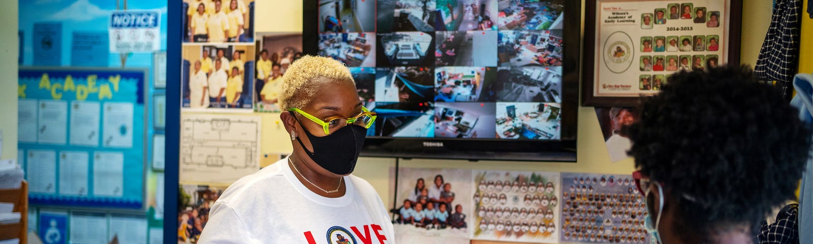 Wilcox Academy owner Rochelle Wilcox (L) speaks with teacher Briceshanay Gresham as childcare centers struggle to hire staff in New Orleans, Louisiana, August 24, 2021. Photo by Kathleen Flynn/Reuters