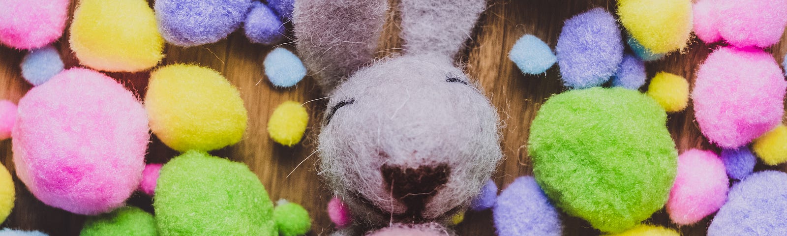 Stuffed Easter Bunny surrounded by pooped chocolates