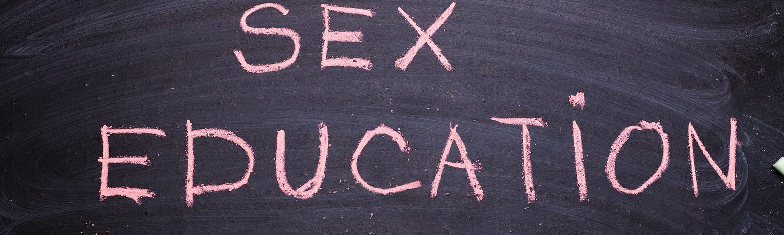 Chalkboard with words: “Sex education”