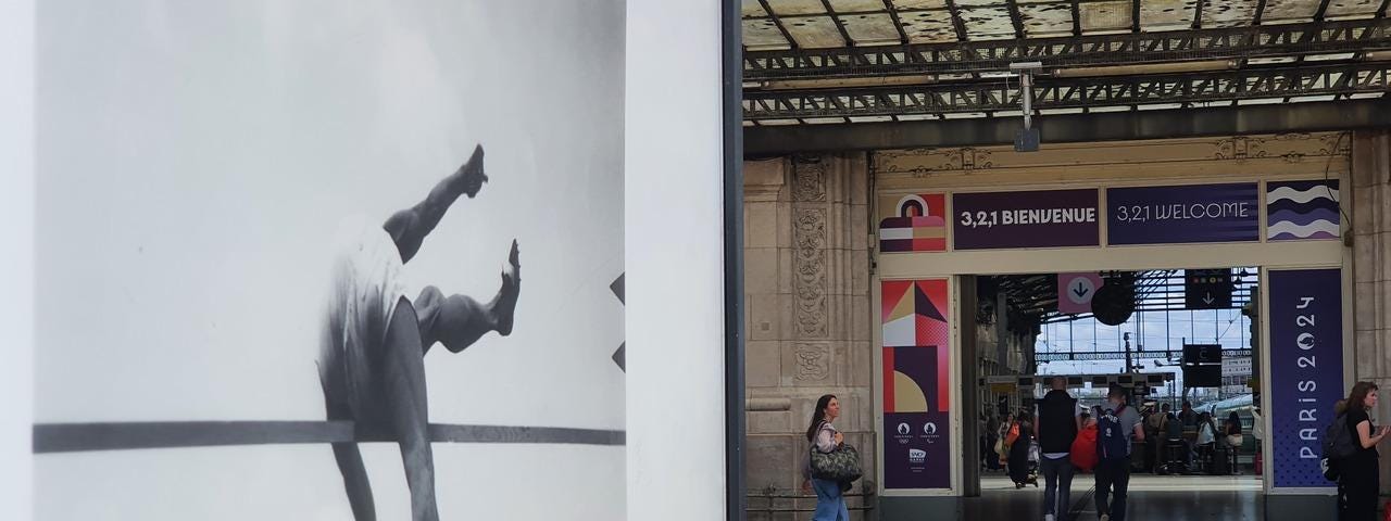 Sport photograph on the left, Gare de Lyon entrance on the right.