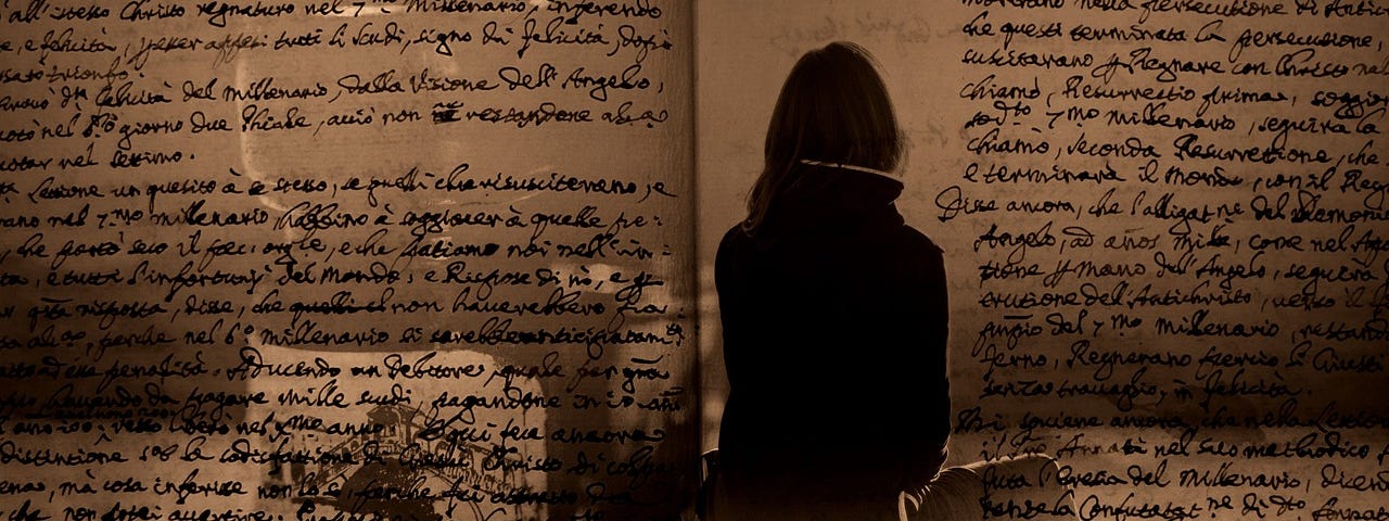 Image of an ancient book with the silhouette of a modern woman and an old fountain pen.