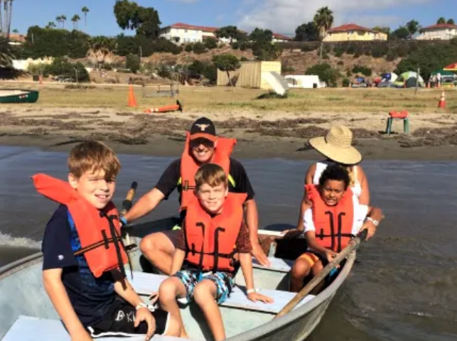 My son in bow with friends and a dad from Cub Scouts.