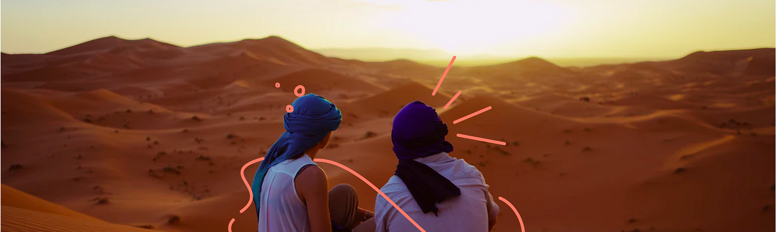 2 pessoas olhando horizonte no deserto