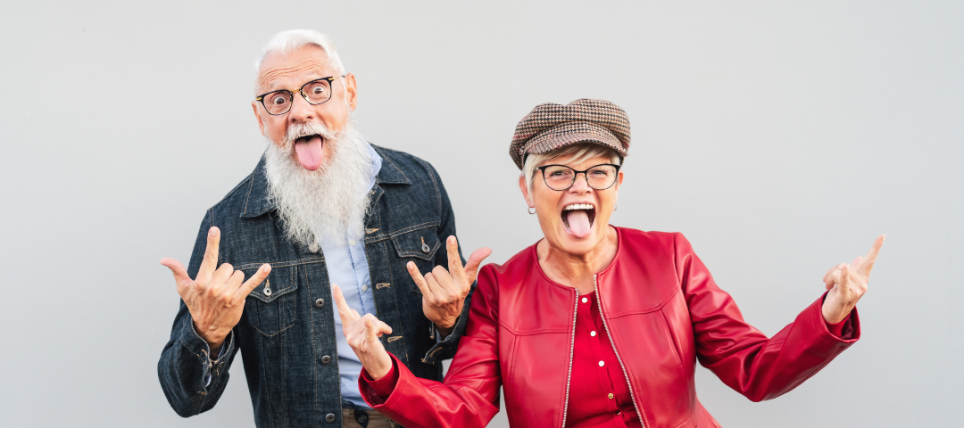 elderly couple pulling silly faces