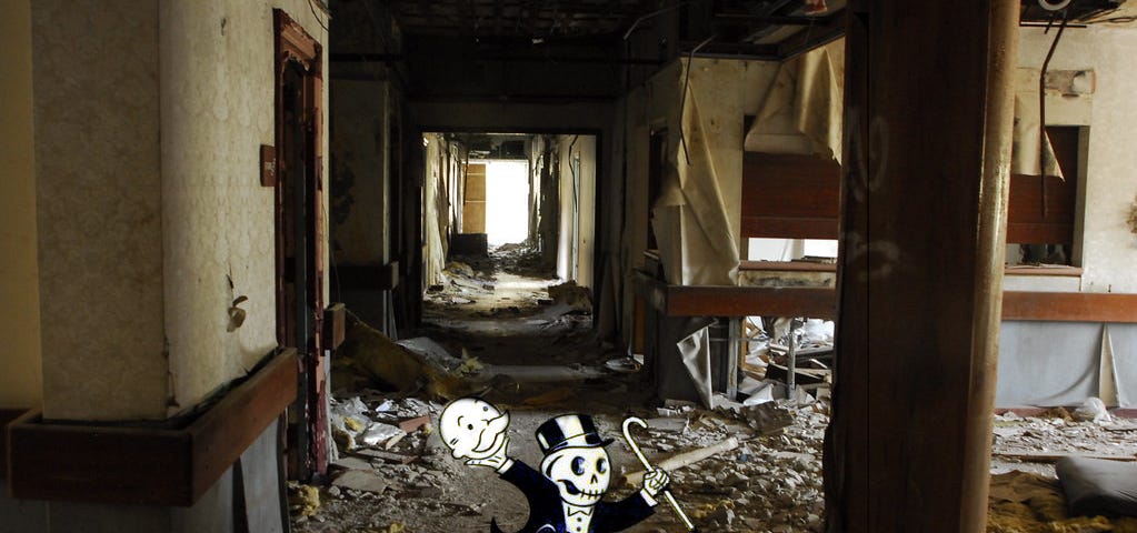 An abandoned, ruined hospital wing; in the foreground, a dancing Uncle Pennybags figure from the Monopoly game, he has removed his face, revealing a skull. Image: Nitram242 (modified) https://www.flickr.com/photos/25165196@N08/7082538687/ CC BY: https://creativecommons.org/licenses/by/2.0/