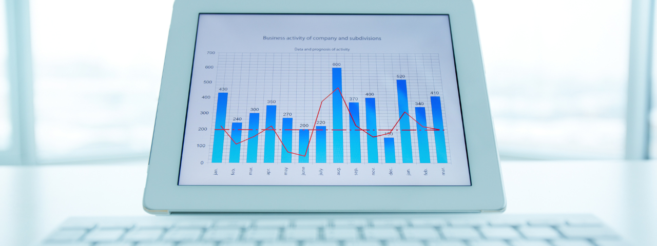 Image of a computer showing a graph of revenue data