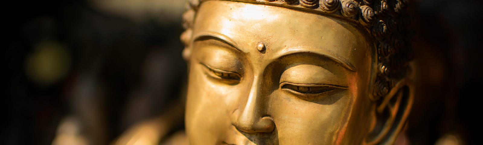 Close-up of a golden Buddha statue.