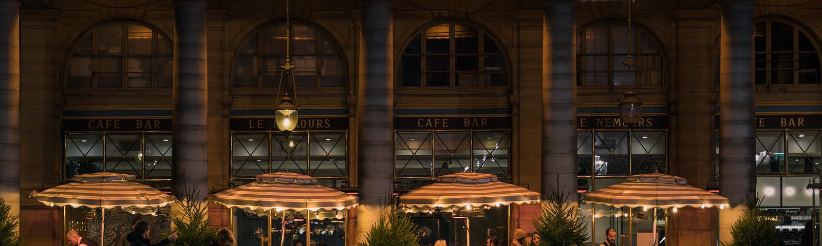 An outdoor cafe in the nighttime