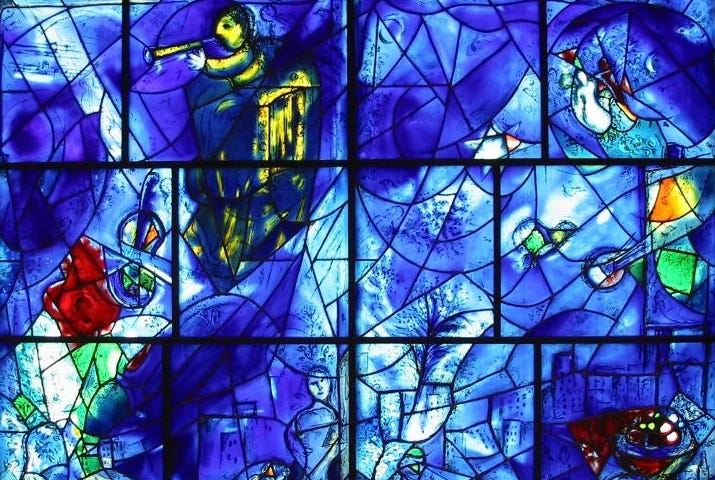 An image of a stained glass window by Marc Chagall.