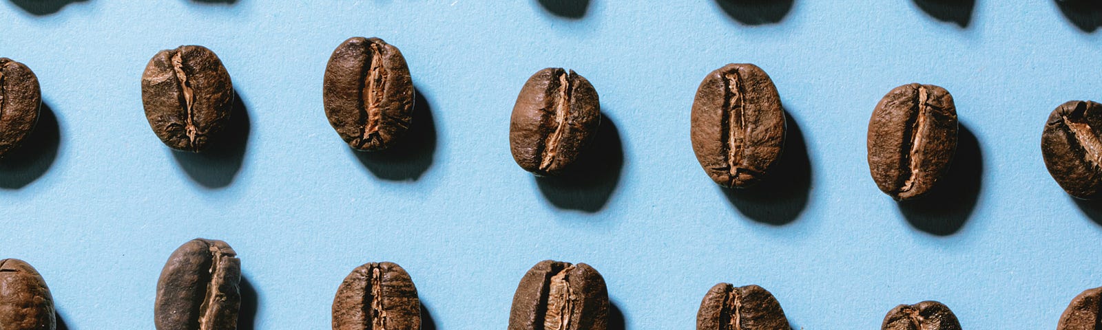 Coffee beans on a blue background