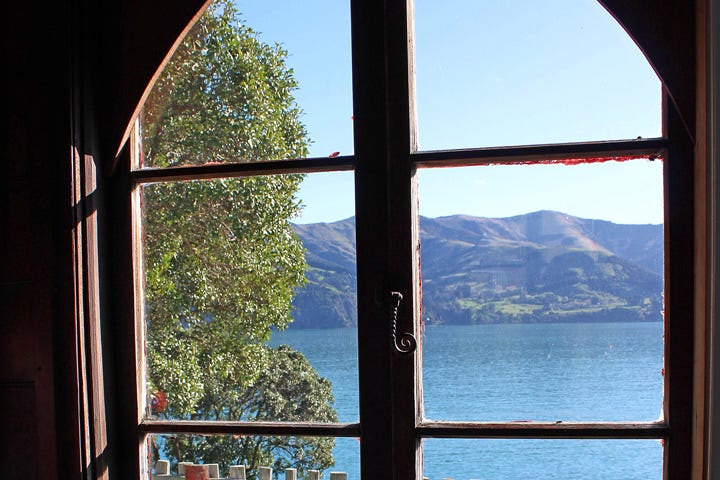 A bay view seen through a chapel window.