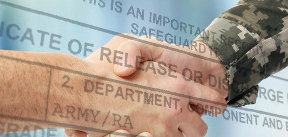 Handshake superimposed over a military discharge form. Photo by Air Force Tech. Sgt. Ter Haar/U.S. National Guard