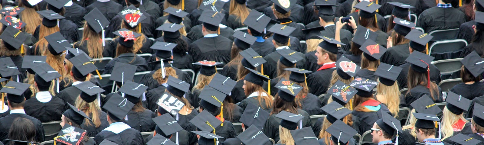 photograph of a group of graduates from above at their graduation ceremony