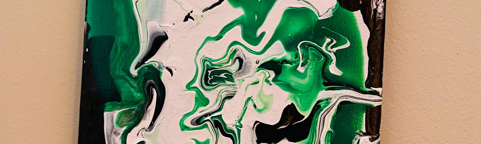 Photo of an abstract art swirly pourover painting created by the author, in black, white, gray, and green which happen to be the colors of the demiromantic flag