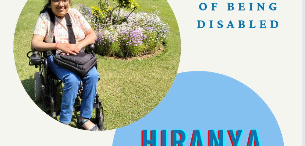 This is a poster about the piece with a photo of Hiranya, who is dressed in white top and jeans, sitting on a wheelchair in a garden with flowers in the backdrop, and looking at the camera, with her name diagonally below that. The name of the piece — The loneliness of being disabled is written at the top right corner. On the left bottom is the word Dislang written in stylized formatting.