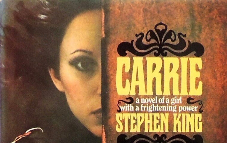 Book cover of Carrie by Stephen King, showing one half of a woman’s face and the words “CARRIE a novel of a girl with a frightening power”