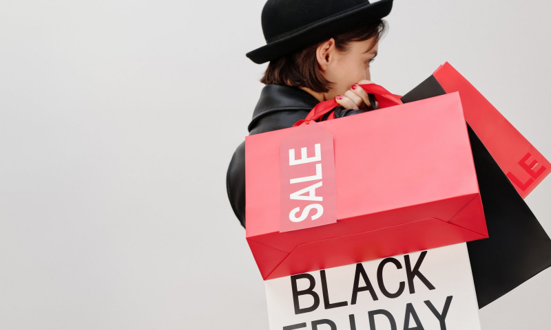 Woman in Black Hat and Black Leather Jacket