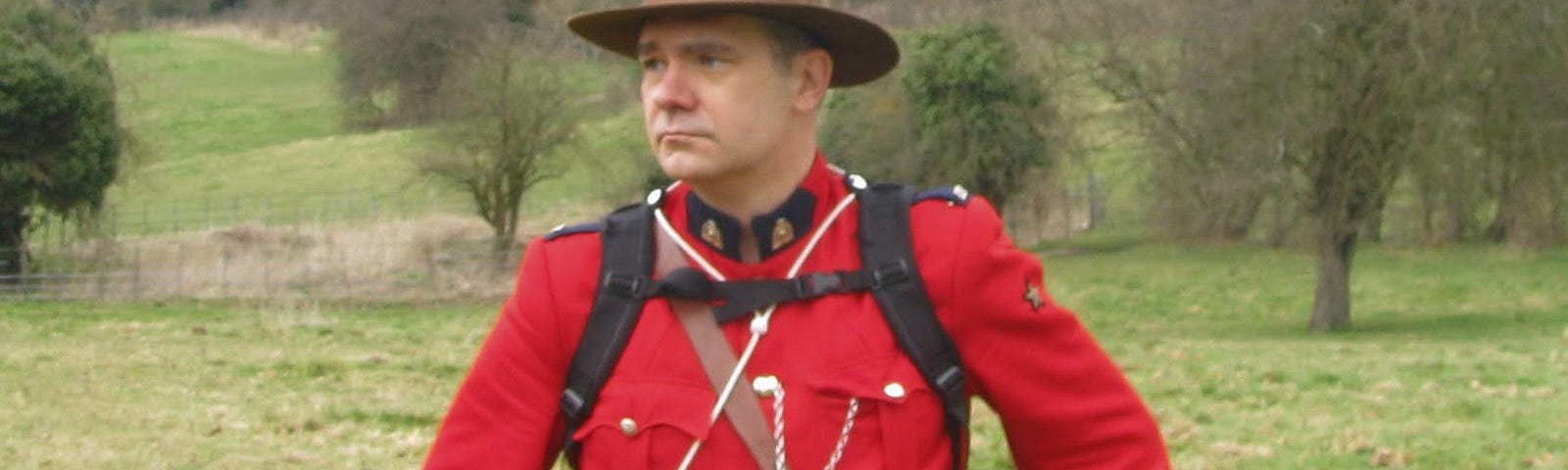 A man dressed as a Canadian Mountie.