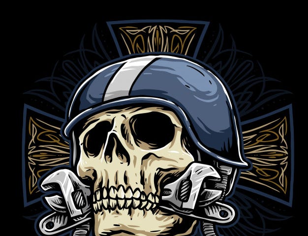 A skull in a motorcycle helmet with wrenches in its teeth.