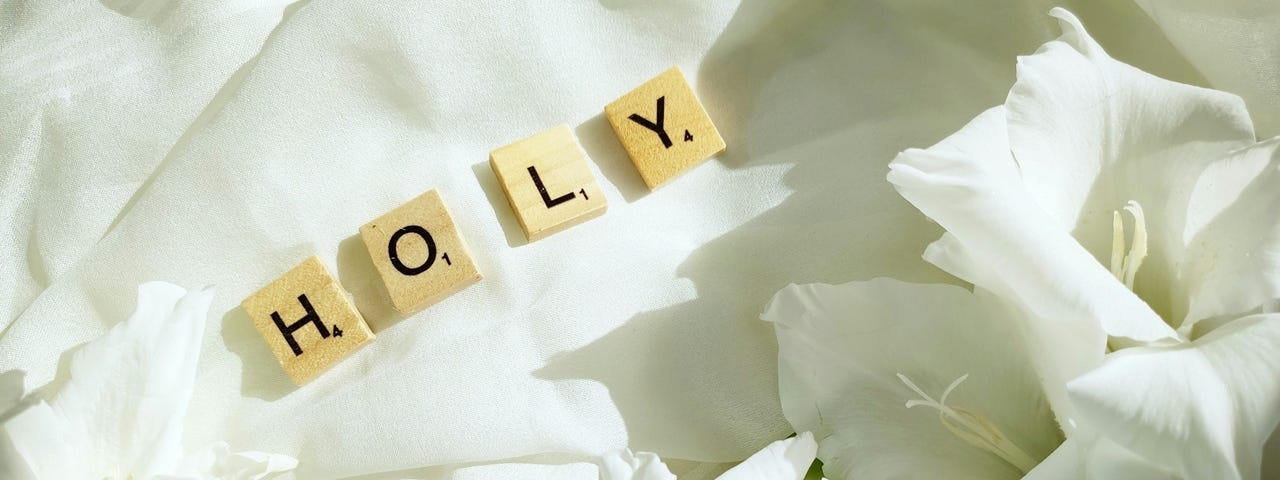 Holy spelled out in Scrabble letters