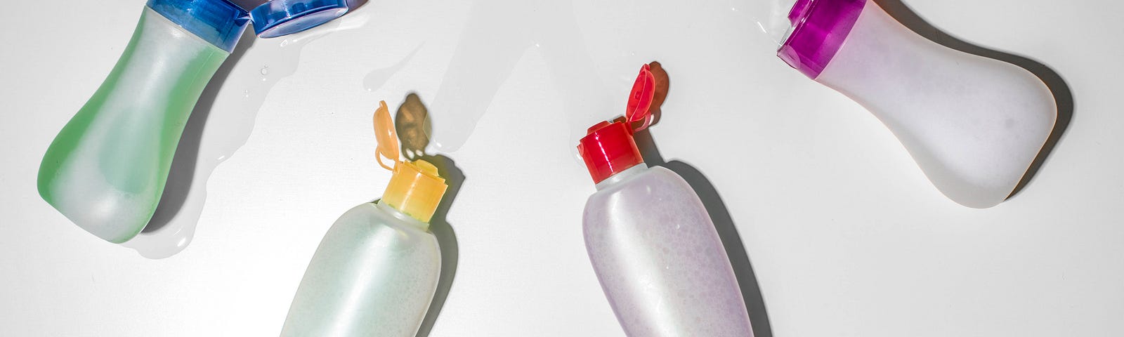 Colorful bottles of trendy skincare products