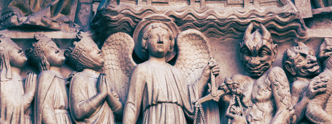 Sculptures of the archangel Michael weighting souls, according to the lives they led on earth. Chosen people are led to the left towards Heaven and the condemned are lead to the right, to hell, by a devil. From the Portal of the Last Judgement