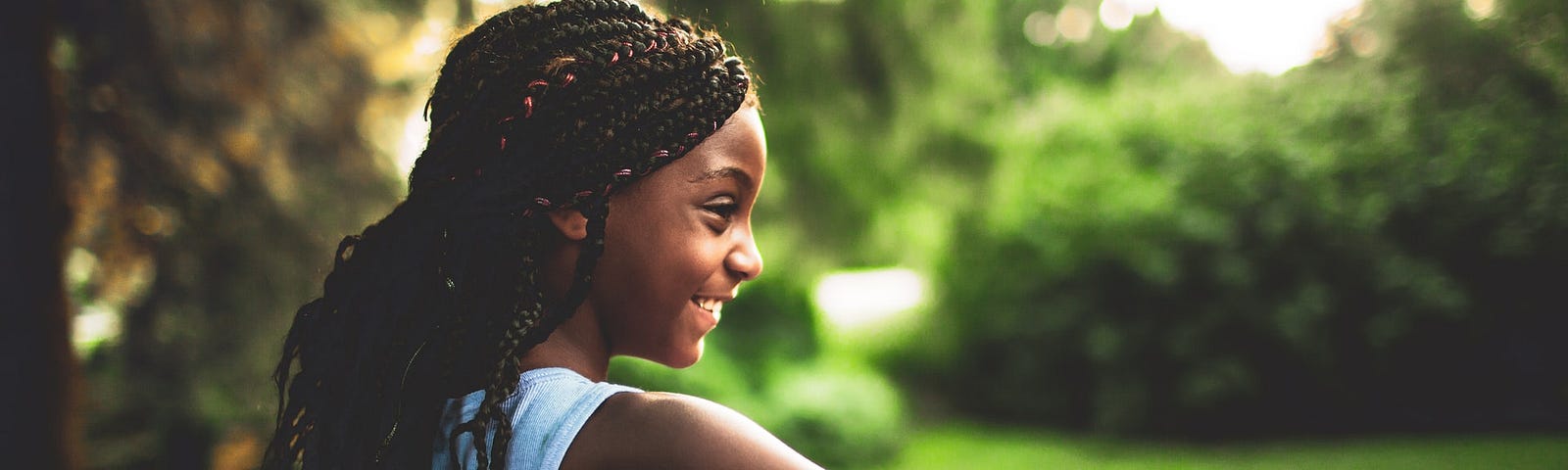 Black kid smiling.