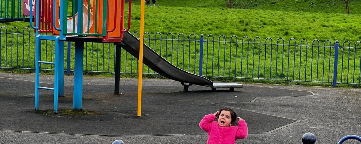 A kid throwing tantrum in playground