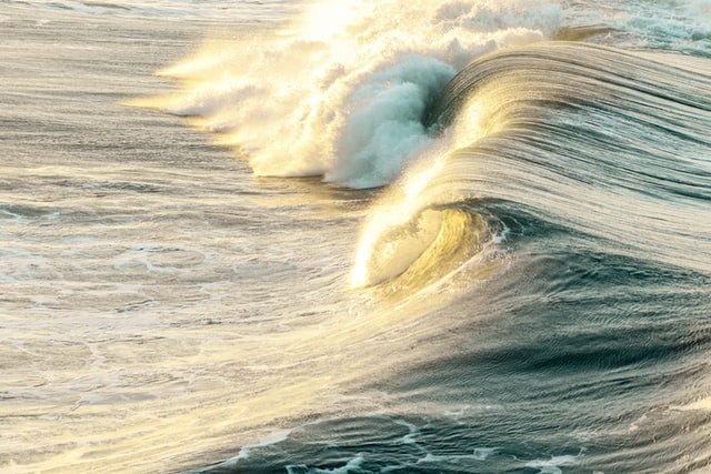 Ocean waves cresting as tide rolls in.