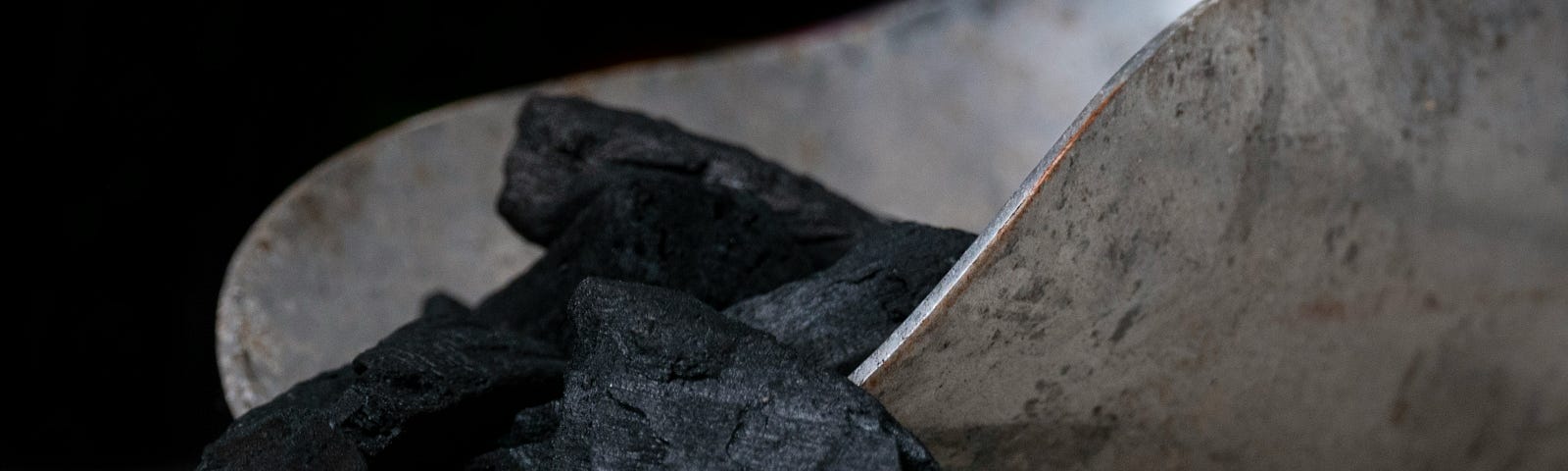 Coal scuttle with coals