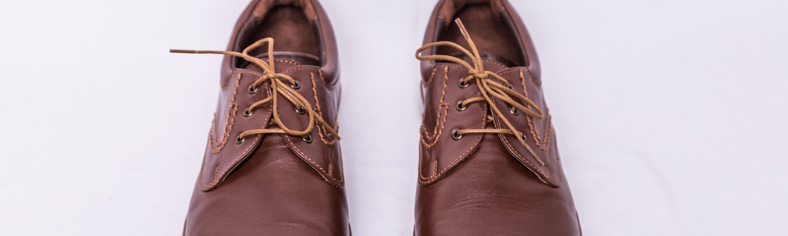 A pair of brown brogues.