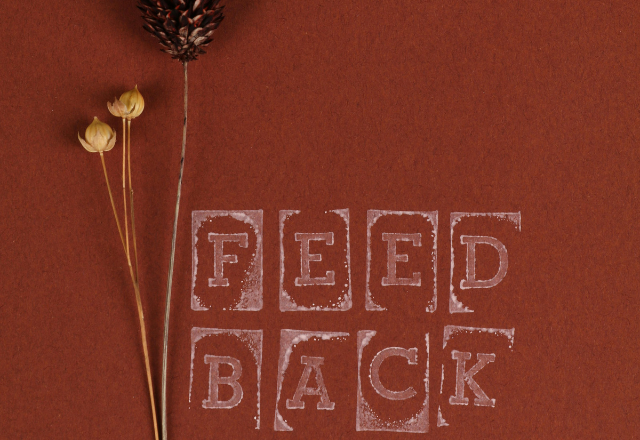 a background with flowers with words of “Feedback”