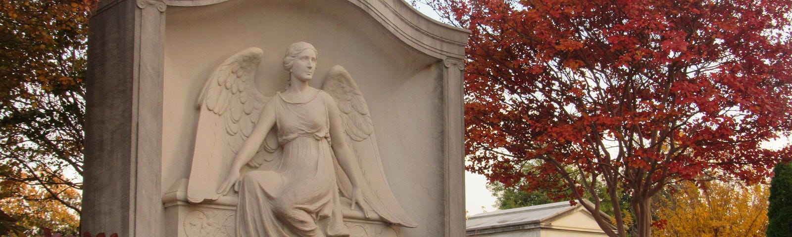 A fall scene of the angelic grave of Mary Glover Thurman.