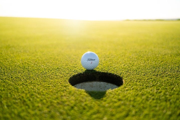 golf ball and cup