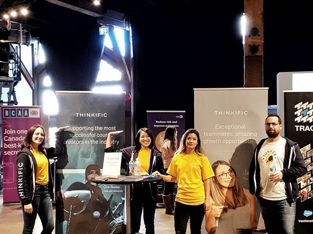 Four members of the Thinkific team at a hiring event