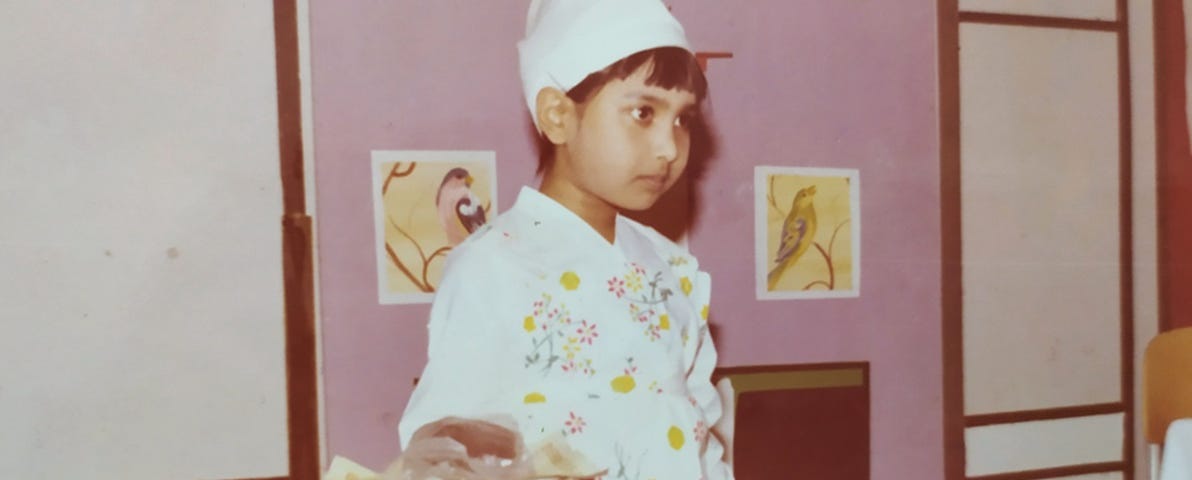 Me, dressed as a baker acting in a play named “The Grumbler”. It was my first play, and I hated rehearsals on it. But then I had a radical transformation.