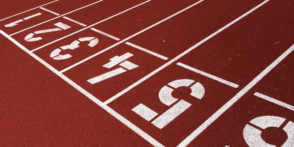 Close-up, oblique view of a running track.
