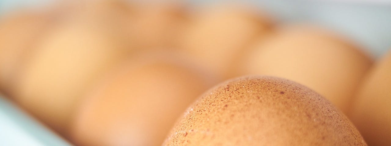 IMAGE: A dozen of eggs in their box photographed with a very nice bokeh