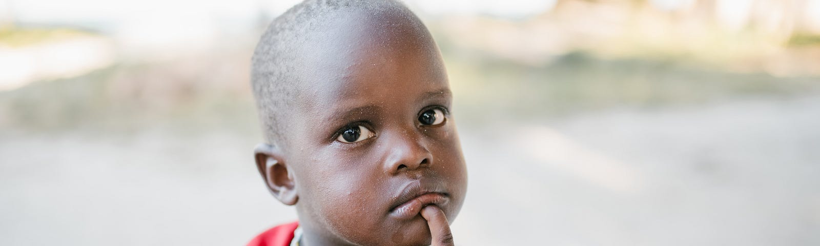 Cute African boy in thought